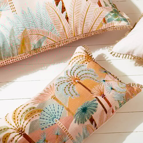 Bird’s eye view of a selection of Karina Jambrak x Adairs cushions. 