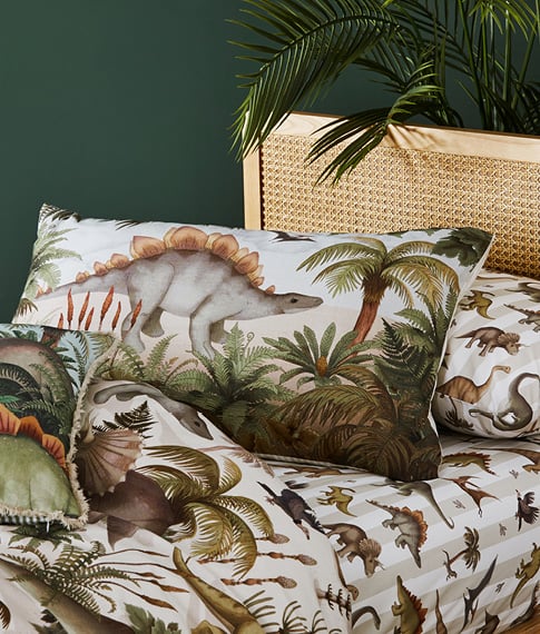 Fleur Harris Prehistorica Pillowcase Separate and matching pillowcase sitting on an Arden Natural Bed.