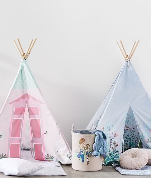 two kids teepees in pink them and light blue floral theme resting behind a toy story storage basket