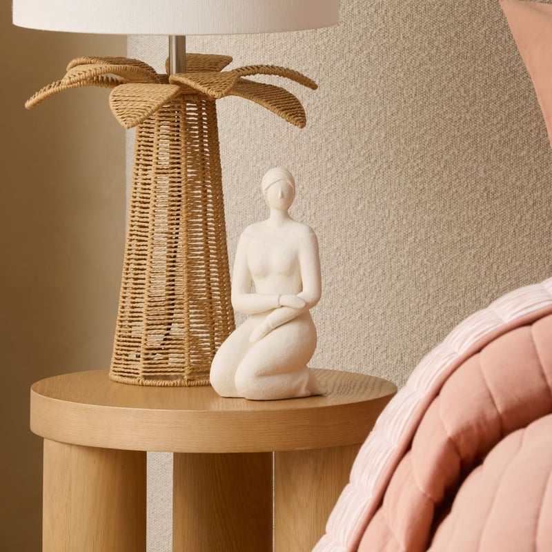 Mila White Turning Statue