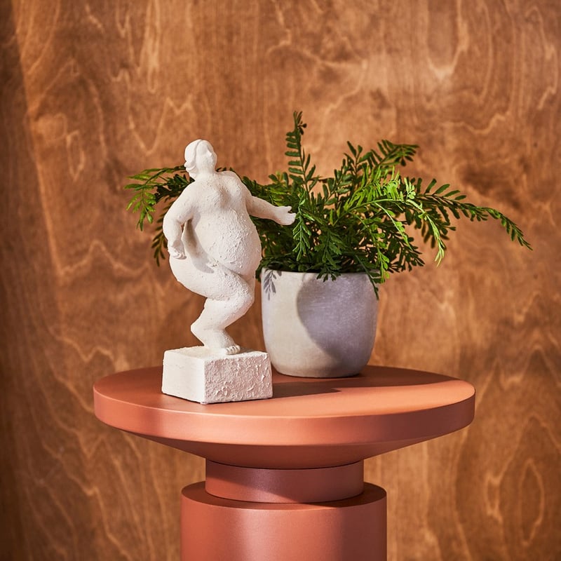 Dancing Romulus Facing White Statue