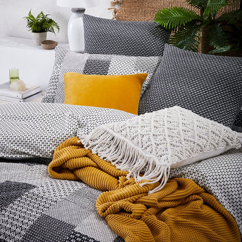 Orion Quilted Black Ivory Quilt Cover