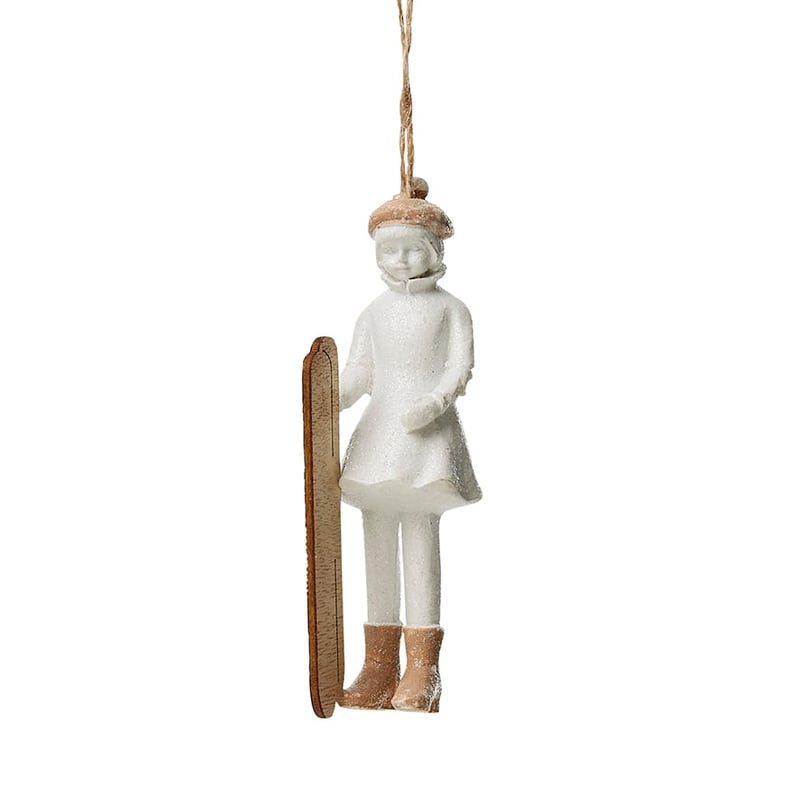 Resin Girl Holding Skates Ornament