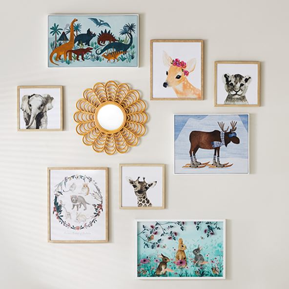 kids wall art with various animal characters hanging on a wall