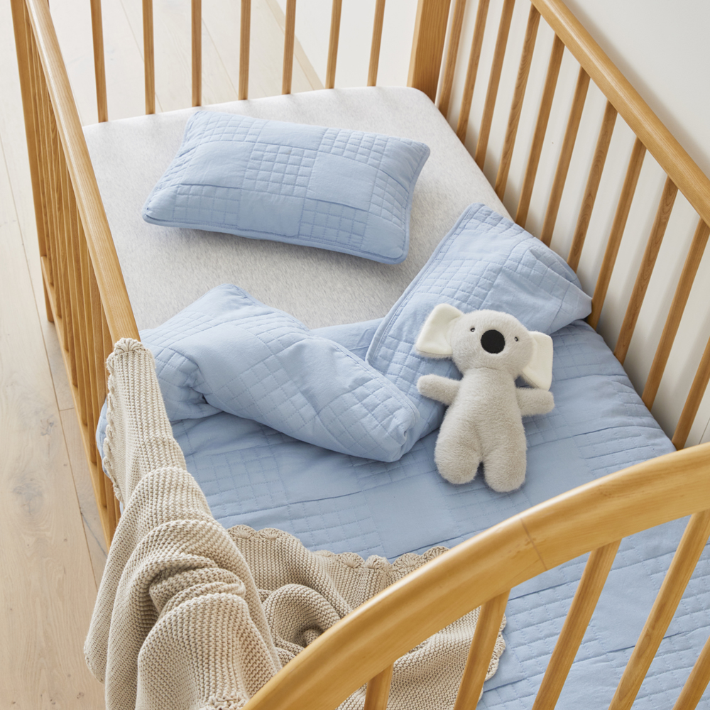 Baby blue cot 2025