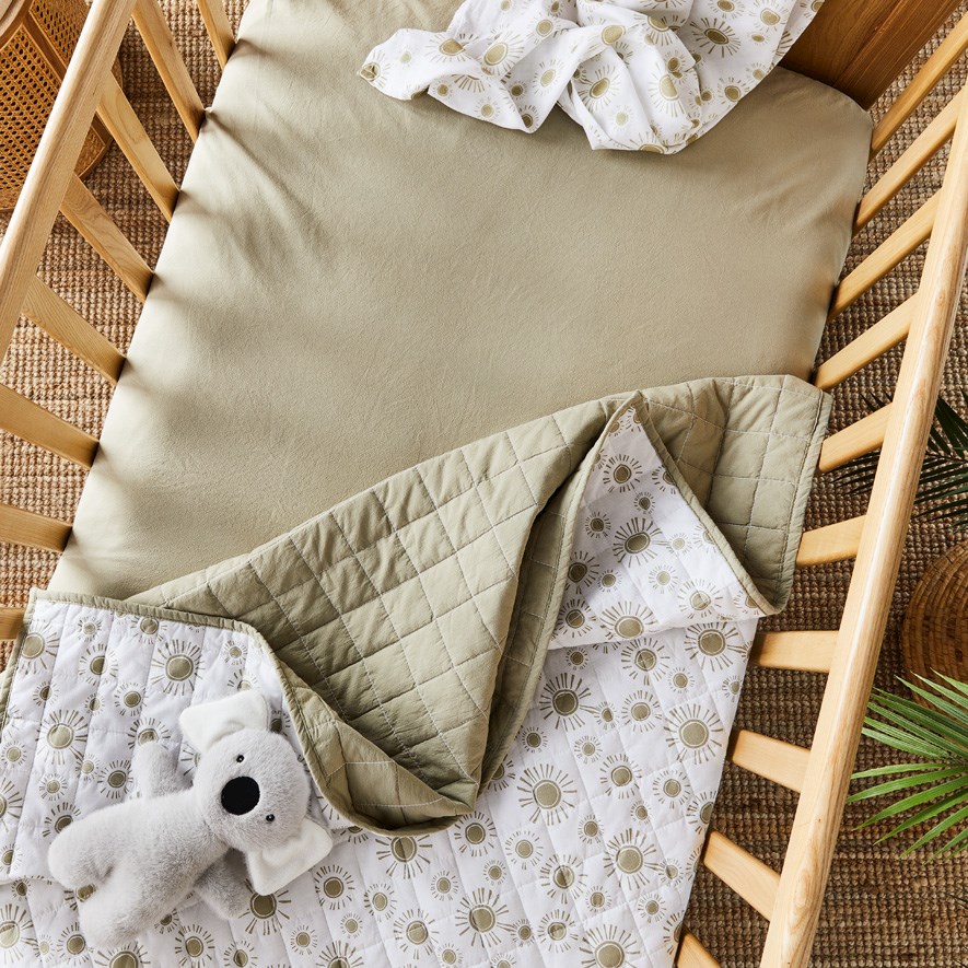 Pillow under fitted discount sheet for baby